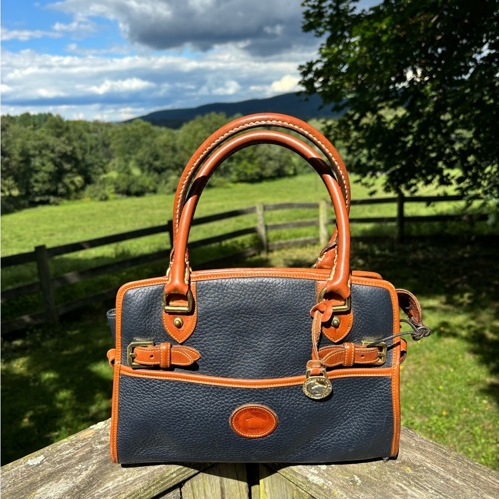 Dooney and Bourke Classic Black and Tan Vintage Leather Handbag